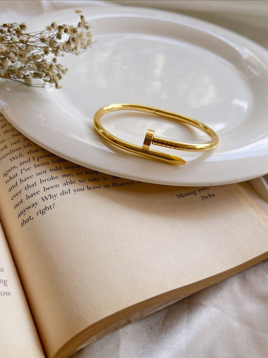 Iconic Golden Nail Bangle