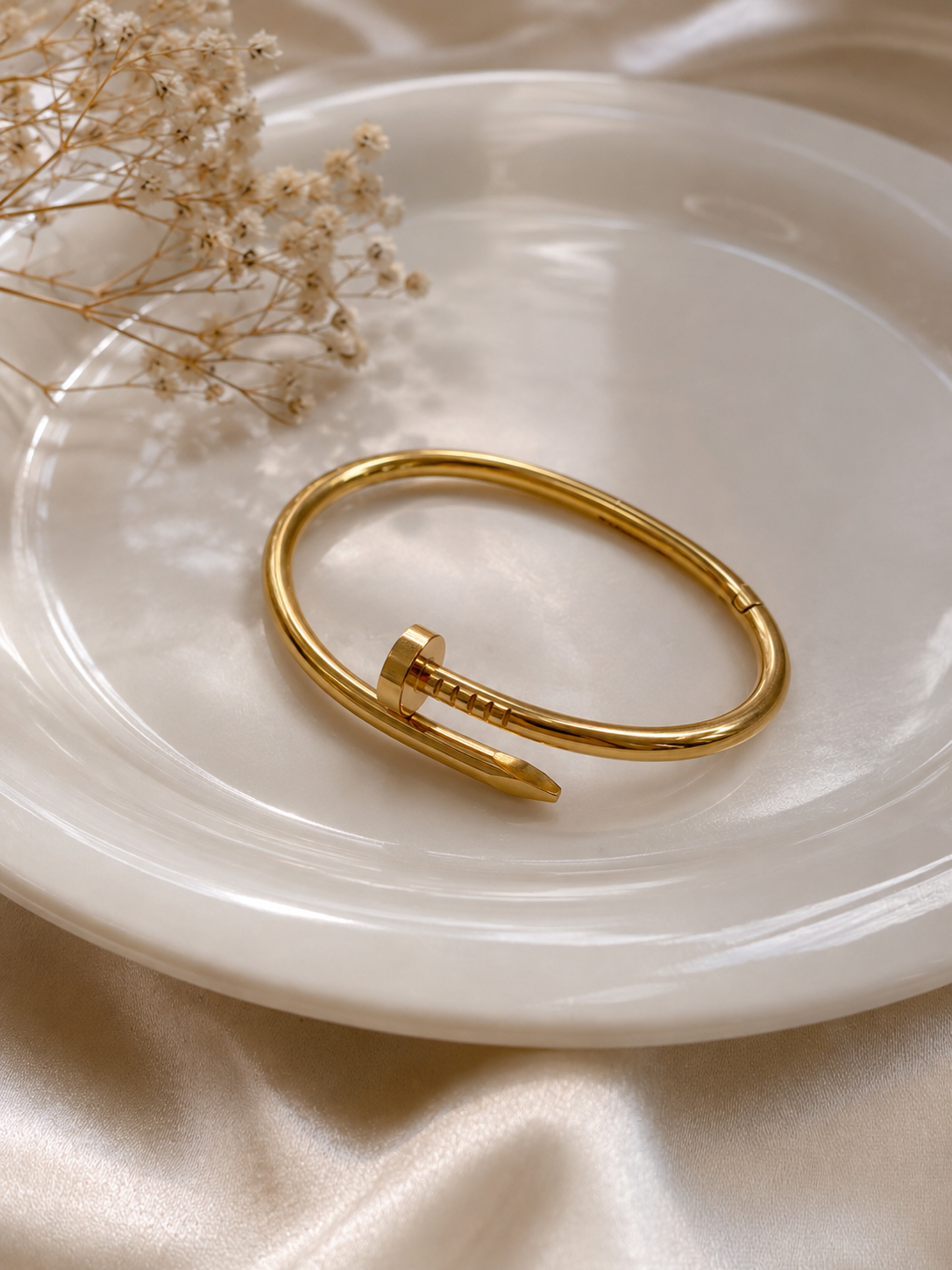 Iconic Golden Nail Bangle