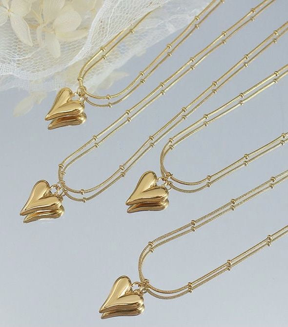 Heart necklace with studs
